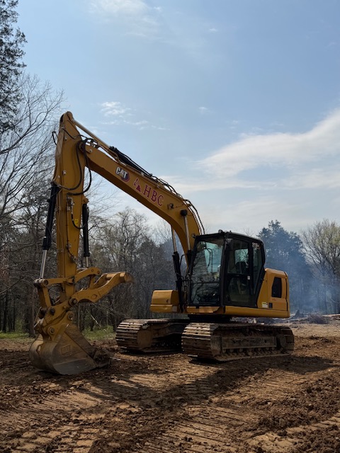 H Buttrey Construction excavator on a Hickman County TN job site